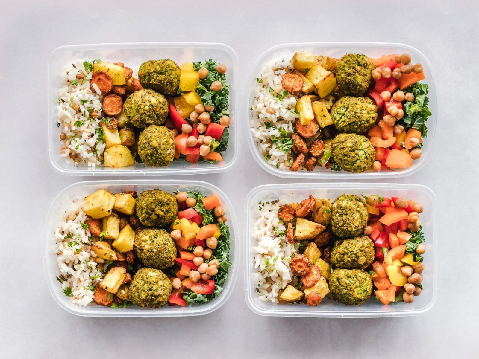 Colorful protein-forward meal-prep containers.